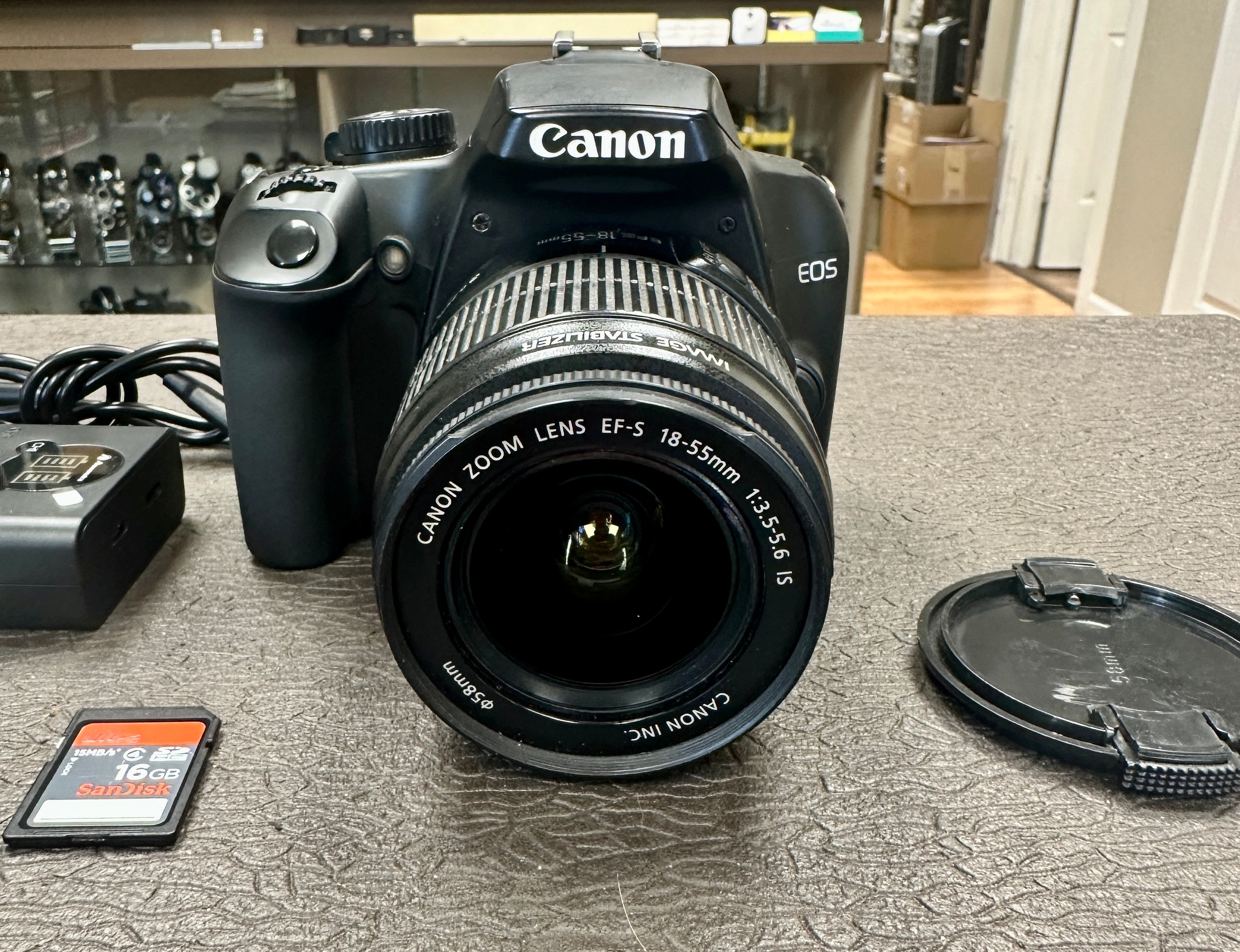 Canon EOS Rebel XS w/ 18-55mm outlets lens